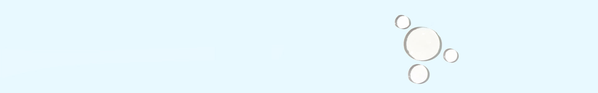 Das Bild zeigt eine paar Tropfen Flüssigkeit auf einem hellblauen Hintergrund an.